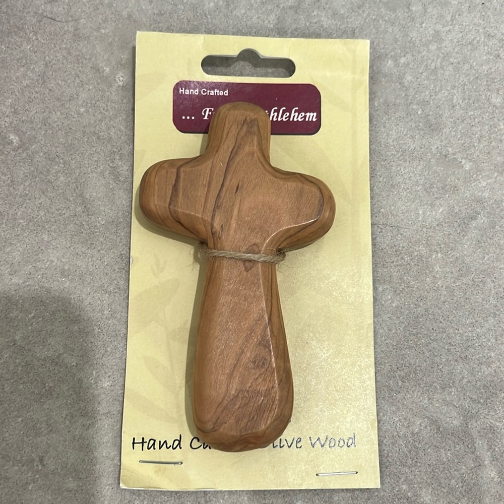 Hand carved olive wood cross. Hand crafted. From Bethlehem. Hold in hand size.